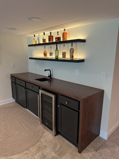 Basement Finishing by Precision Custom Woodwork & Remodeling - Basement Finishing project featuring Moisture Control, Custom Lighting, Durable Flooring in Maryland and Northern Virginia