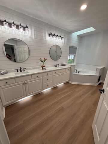 Luxury Bathroom Remodel by Precision Custom Woodwork & Remodeling - Bathroom Remodeling project featuring Custom Vanity, Marble Countertops, Modern Fixtures in Maryland and Northern Virginia