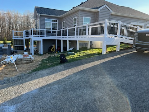 Elevated backyard deck in Arlington, Virginia by Precision Custom Woodwork & Remodeling