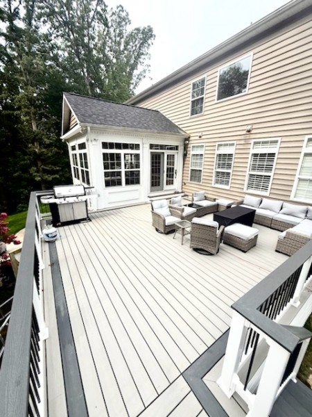 Multi-level composite deck in Leesburg, Virginia by Precision Custom Woodwork & Remodeling