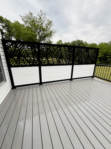 Composite backyard deck in Alexandria, Virginia by Precision Custom Woodwork & Remodeling